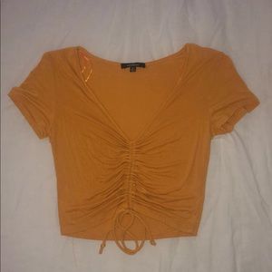 yellow v-neck croptop